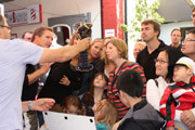 BIM's John Hickey shows spectators the eggs visible on the underside of a female lobster.